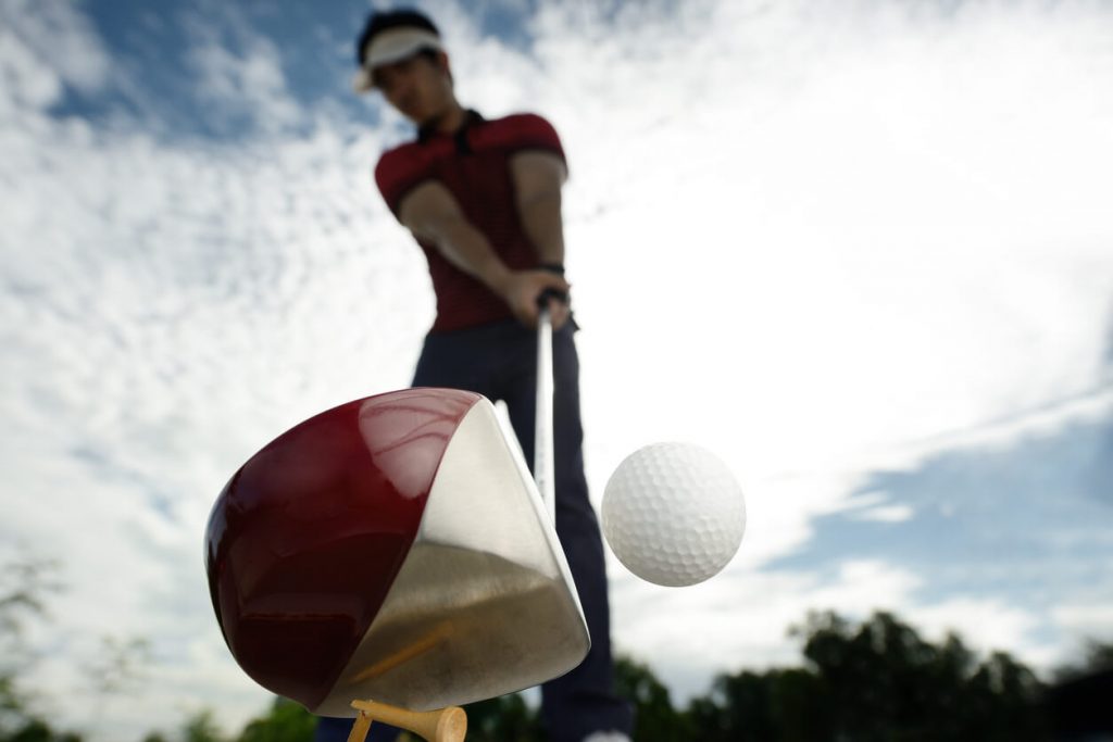 how to hit a golf ball further by slowing it down